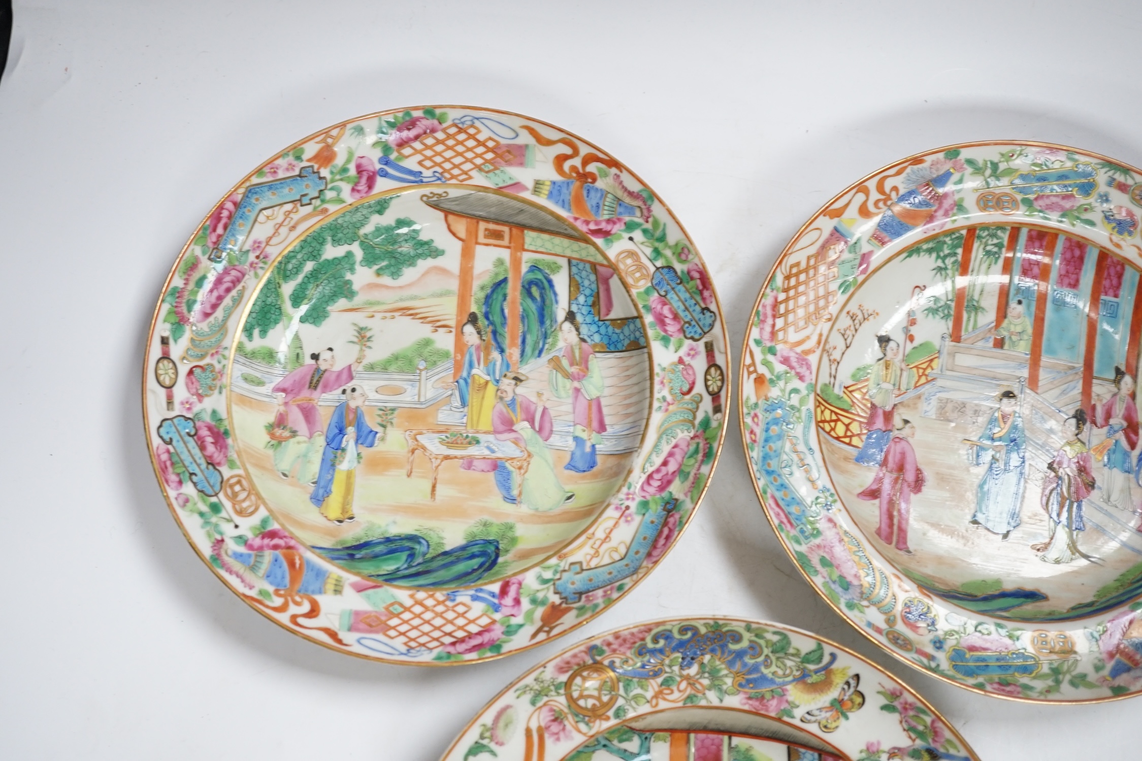 Three early 19th century Chinese famille rose soup plates, 25.5m diameter